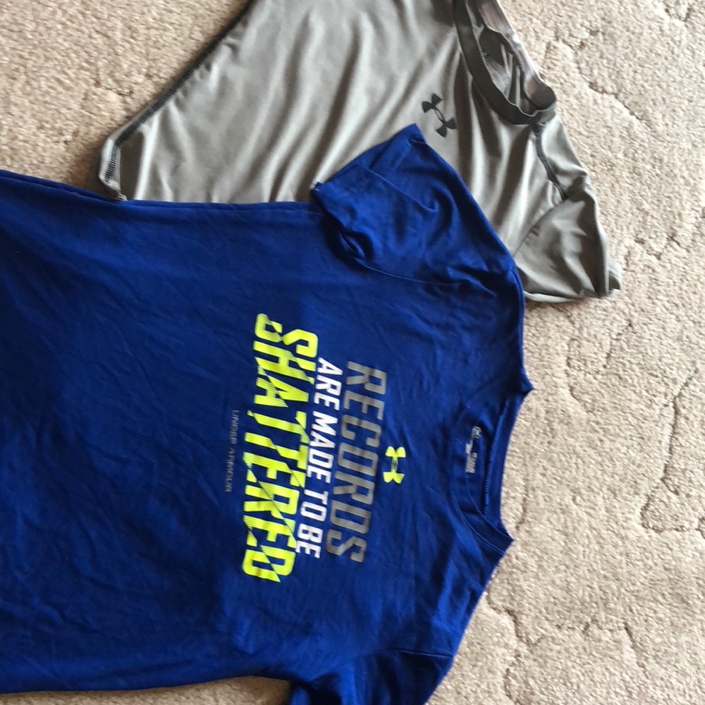 2 under Armour shirts